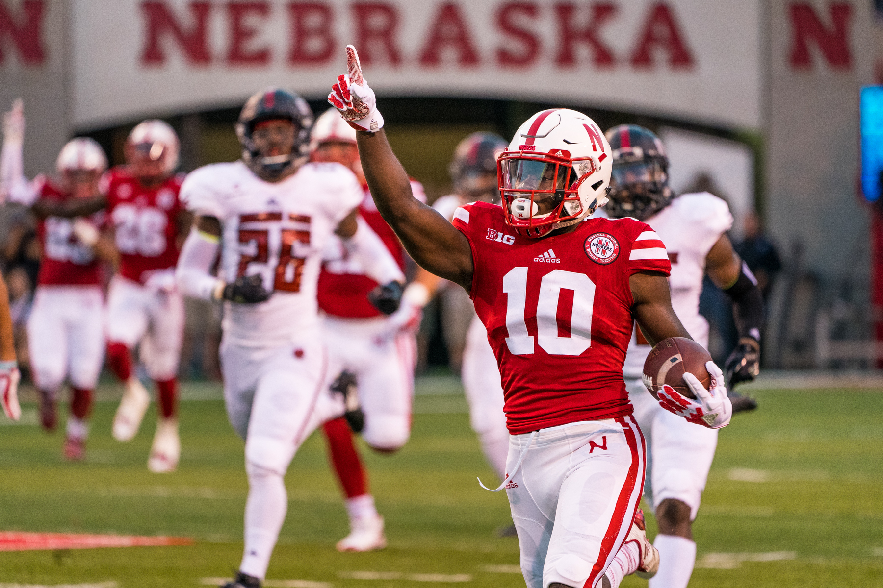 JD Spielman #10 of the Nebraska Cornhuskers returns a kickoff 99 yards on the first touch of his career during Nebraska's game against Arkansas State at Memorial Stadium on Sept. 2, 2017. Photo by Aaron Babcock, Hail Varsity