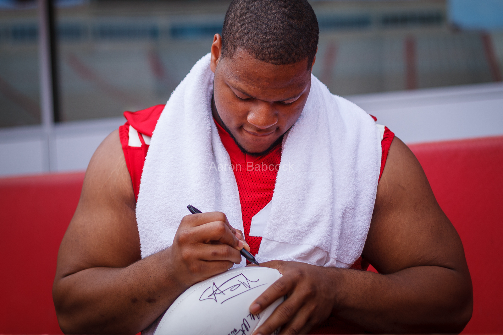 Ndamukong Suh signs autographs during Fan Day on Aug. 8, 2009. © Aaron Babcock