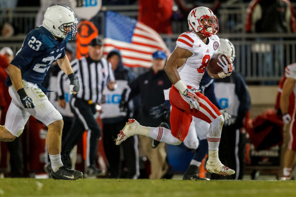 football player and american flag